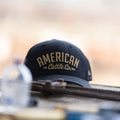 A Rural Cloth ACC Embroidered Hat, featuring the words 