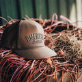 An ACC Waxed Canvas hat from Rural Cloth, featuring 