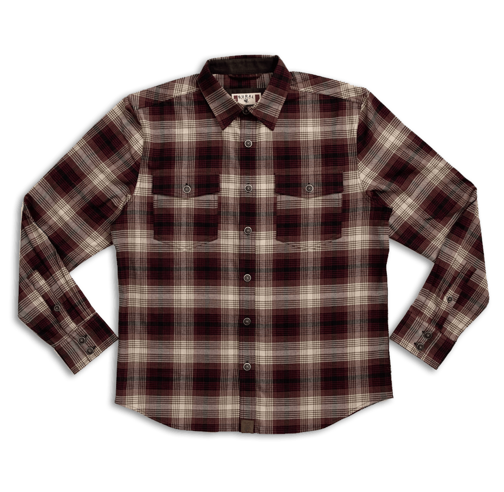 The Foreman Stretch Flannel by Rural Cloth is a long-sleeved, button-up flannel shirt featuring a rugged plaid pattern in shades of red, black, and white. It includes a collar, two chest pockets with buttoned flaps, and buttons on the cuffs. Crafted from performance stretch fabric for added comfort and durability.