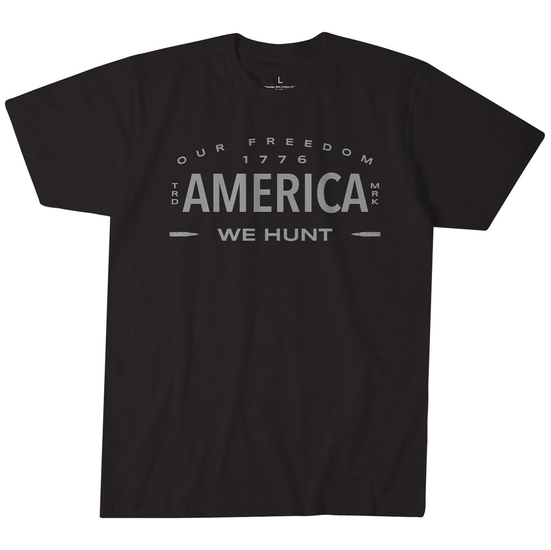 The black Large (L) Hunt America Tee by Rural Cloth features white text that reads: "OUR FREEDOM 1776 HUNT AMERICA WE HUNT," with "AMERICA" prominently displayed in the center. Made from premium weight fabric, this T-shirt is perfect for American hunters.