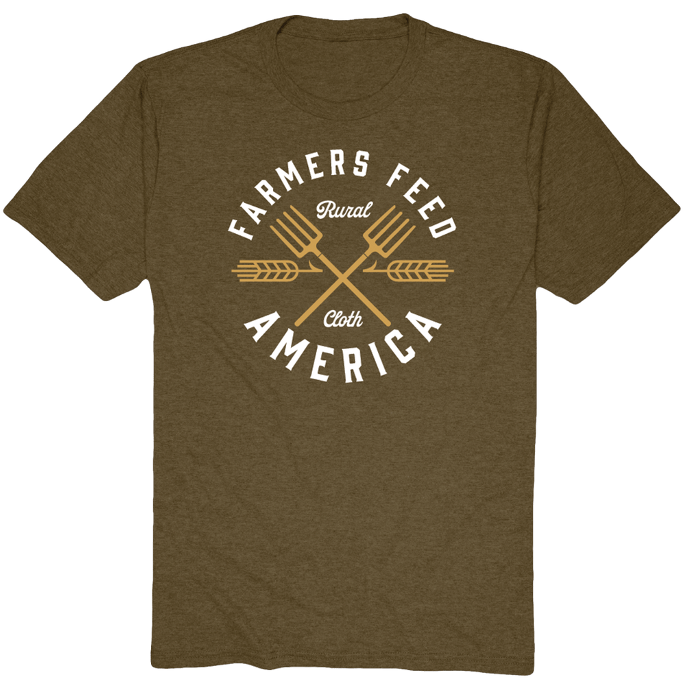 The Pitchfork Tee by Rural Cloth is a brown t-shirt that pays tribute to American agriculture. It features the text "Farmers Feed America" in white, with "Rural Cloth" elegantly scripted at the center. The design includes two crossed pitchforks and two wheat stalks, making it an ideal choice for anyone proud of our nation's farmers.