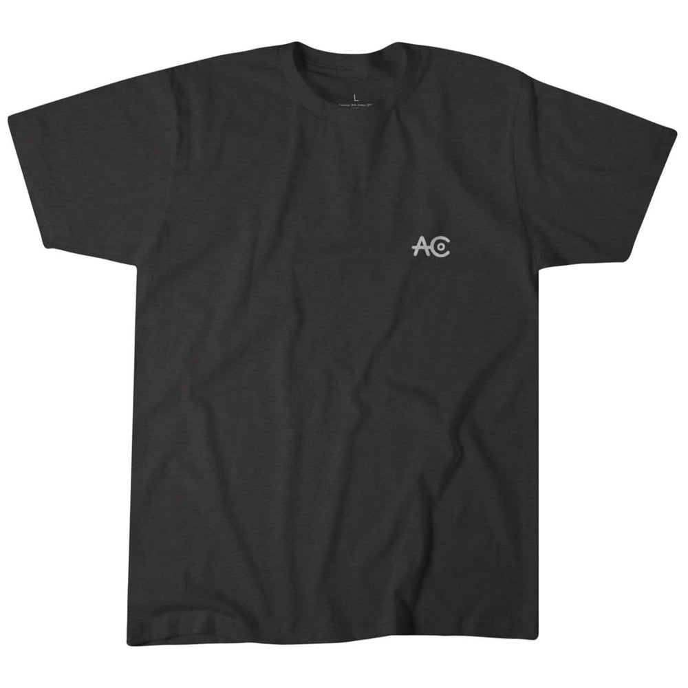 The Quality Goods Tee by Rural Cloth is a plain black T-shirt made from super soft cotton, featuring the letters "AC" elegantly printed in white on the left chest. Made in the USA.