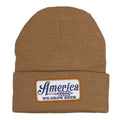 The We Grow Beer Beanie by Rural Cloth is a cozy barn-colored accessory featuring a front patch that proudly declares 