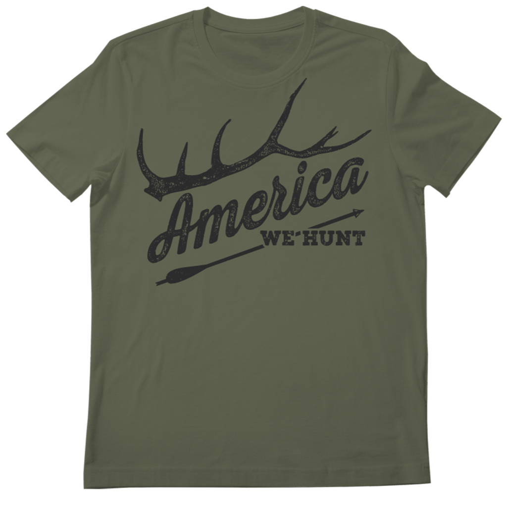 The America We Hunt Tee by Rural Cloth is perfect for outdoor enthusiasts. This green t-shirt features a striking black graphic of an antler and an arrow with 