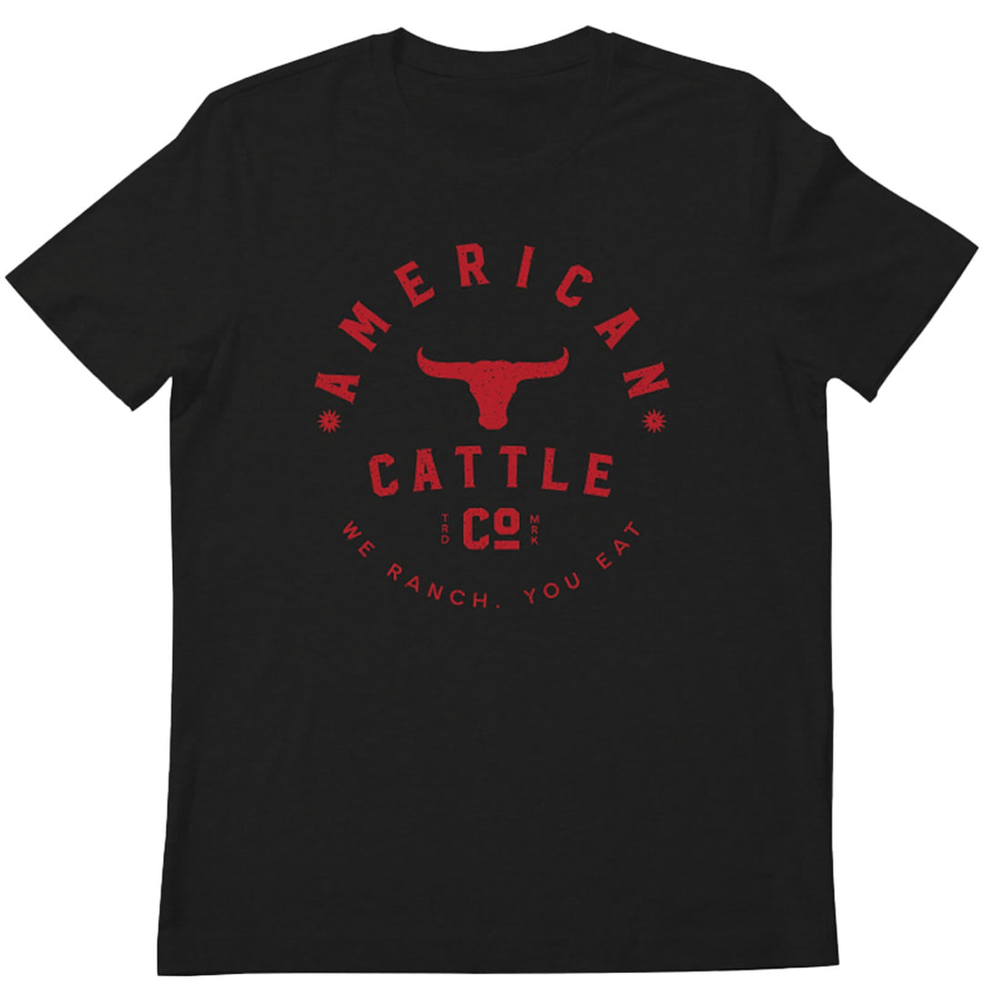 The Bull Tee by Rural Cloth is a black t-shirt adorned with a striking red graphic design. The text "AMERICAN CATTLE CO." encircles a stylized longhorn skull, while "WE RANCH. YOU EAT" is printed below it. The design pays homage to Western culture, featuring two star-like symbols flanking the top text.
