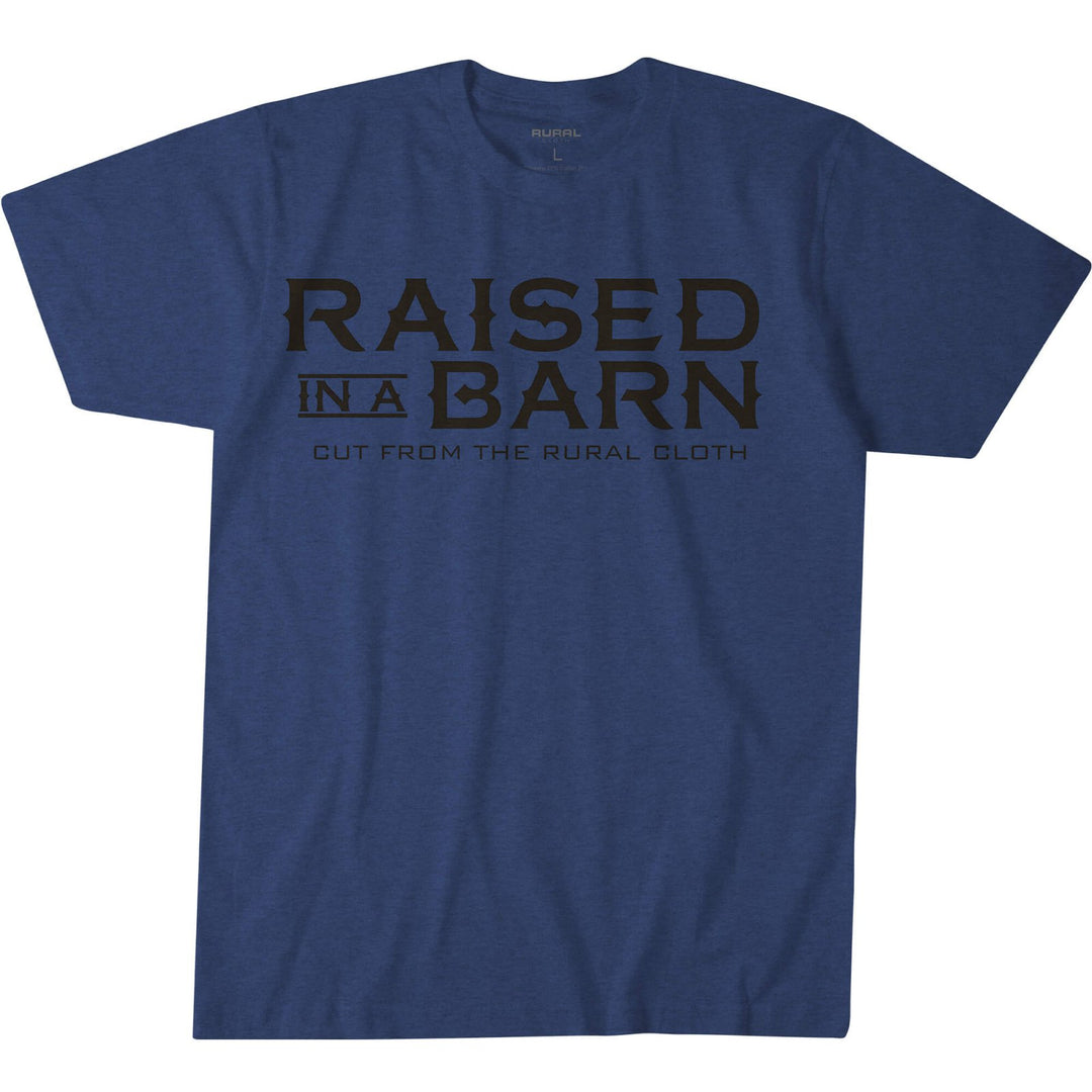 Introducing the Raised in a Barn Tee-Heather Navy by Rural Cloth. This shirt features large black text that reads, "RAISED IN A BARN," accompanied by smaller text underneath stating, "CUT FROM THE RURAL CLOTH." Made from American-grown cotton, it offers a comfortable and durable feel with a vintage fitted look and no additional graphics or logos.