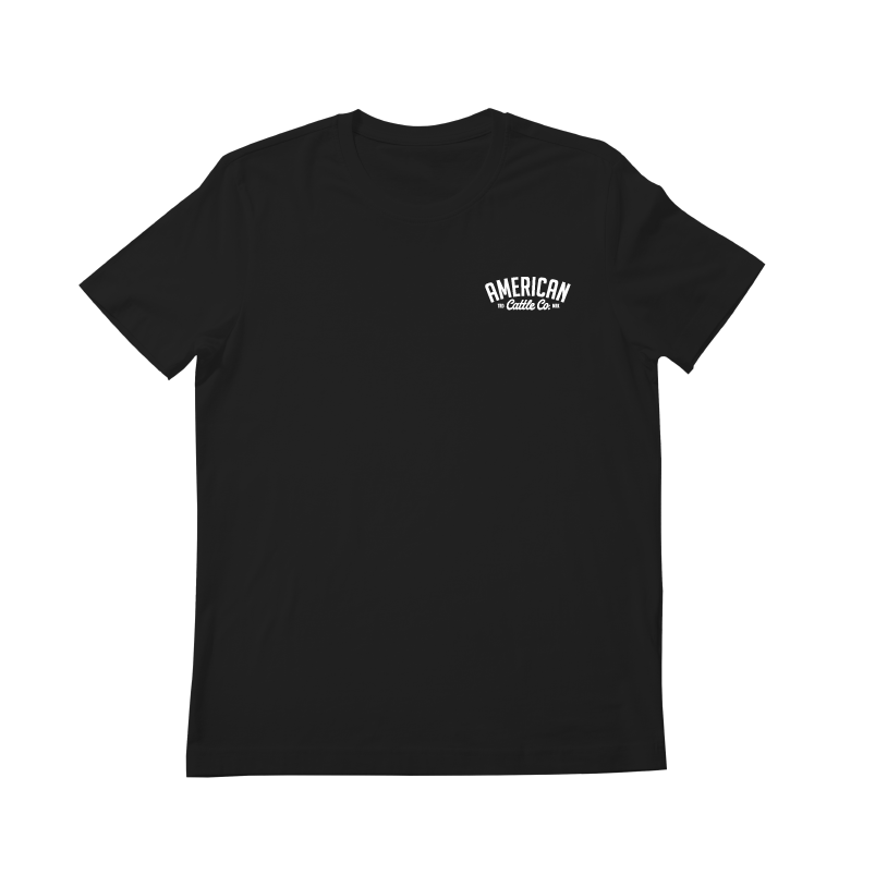 A black short-sleeve t-shirt from Rural Cloth's Skull & Roses Tee collection, featuring "AMERICAN Coffee Co." printed in white on the left chest area. The shirt boasts a classic crew neck design and a simple, clean look, reminiscent of the rugged charm seen in American Cattle Co. apparel.