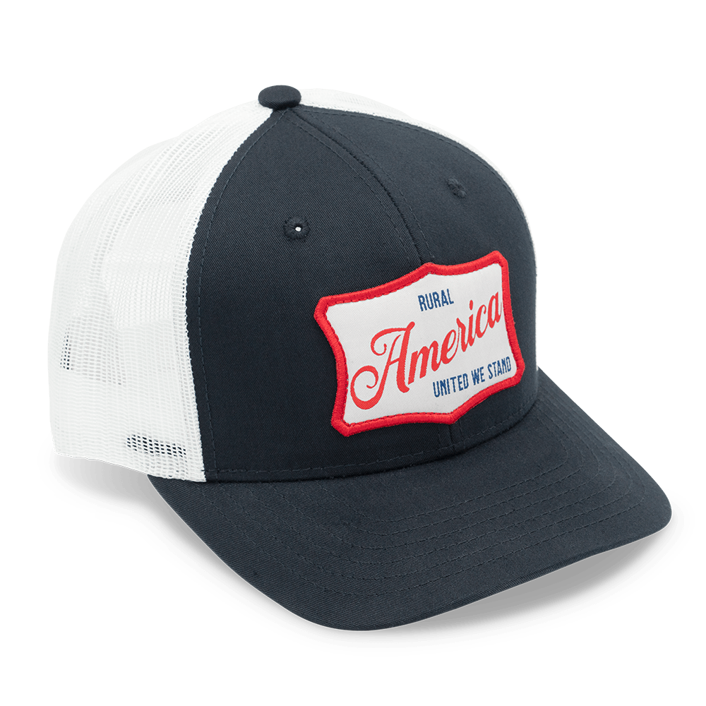 A dark-colored United We Stand Hat from Rural Cloth features a white mesh back and a front patch with red and blue text reading 